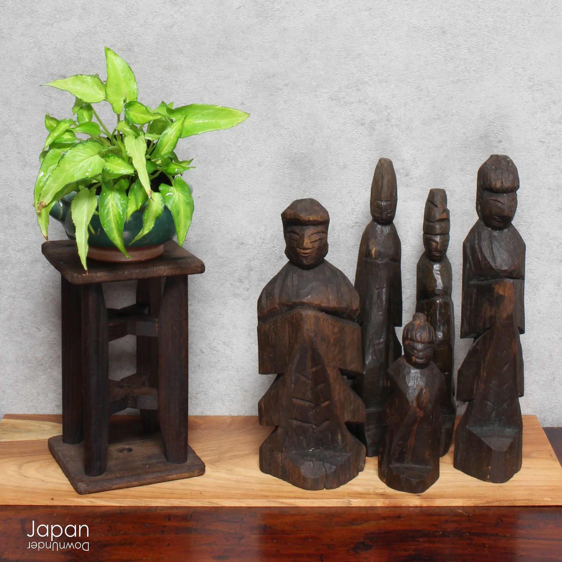A collection of old hand-carved Enku-style Buddha and Kannon statues.  Enku was a Buddhist monk, much loved for his simple, folk art statues, carved during his many pilgrimages  to the mountains.  These old carvings are made of a light wood.