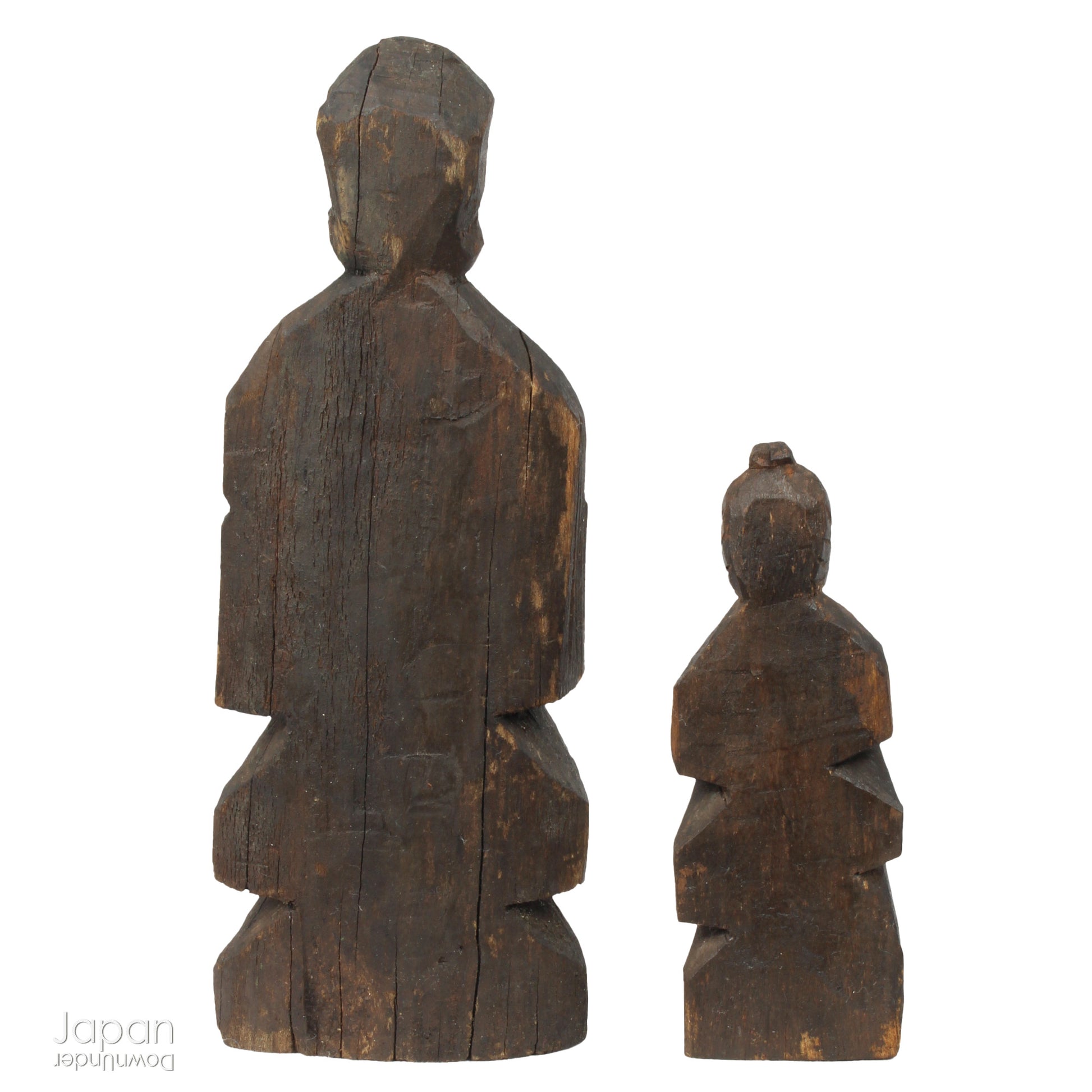 A collection of old hand-carved Enku-style Buddha and Kannon statues.  Enku was a Buddhist monk, much loved for his simple, folk art statues, carved during his many pilgrimages  to the mountains.  These old carvings are made of a light wood.