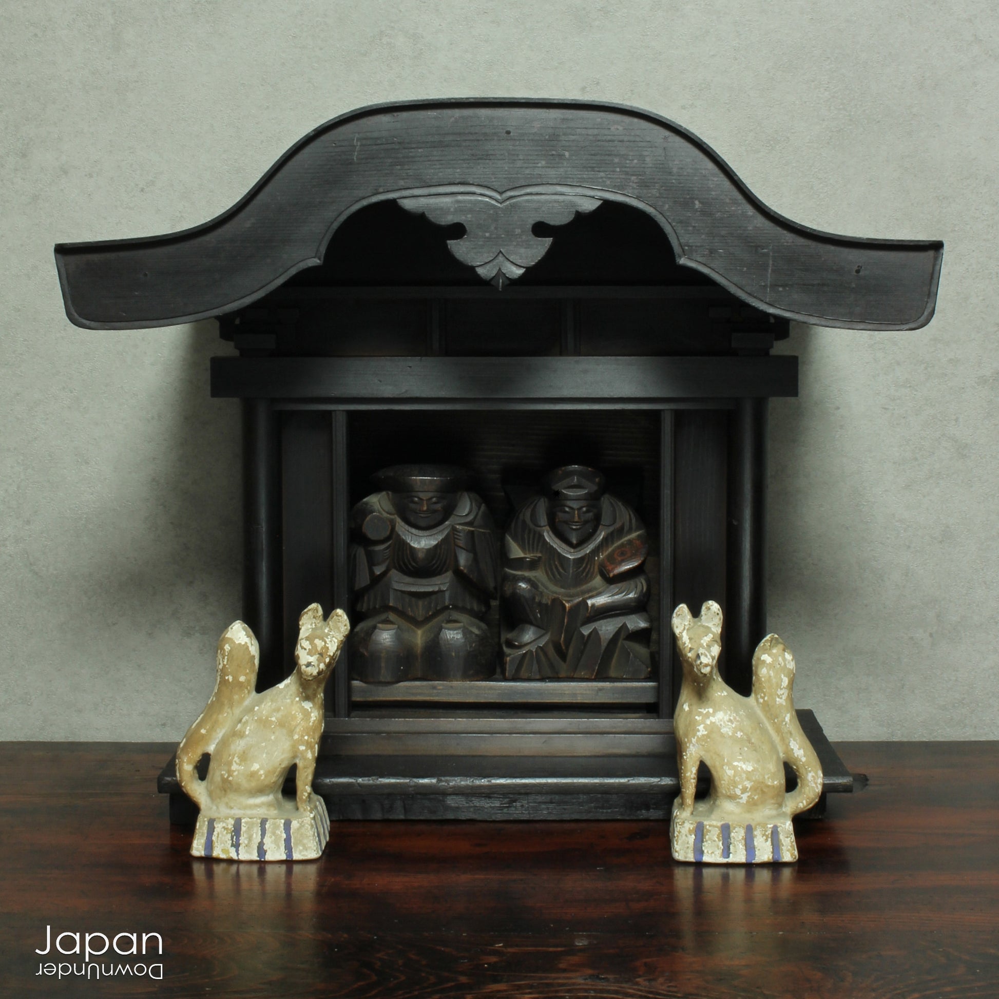 Experience the profound spirituality and artistry of Japan with this authentic Shinto folk faith shrine, dating back to the Meiji era. Perfectly suited for your own kamidana (god shelf) or as a sacred focal point within your home, this antique shrine honors the beloved lucky gods Ebisu and Daikoku - symbols of prosperity, good fortune, and well-being.