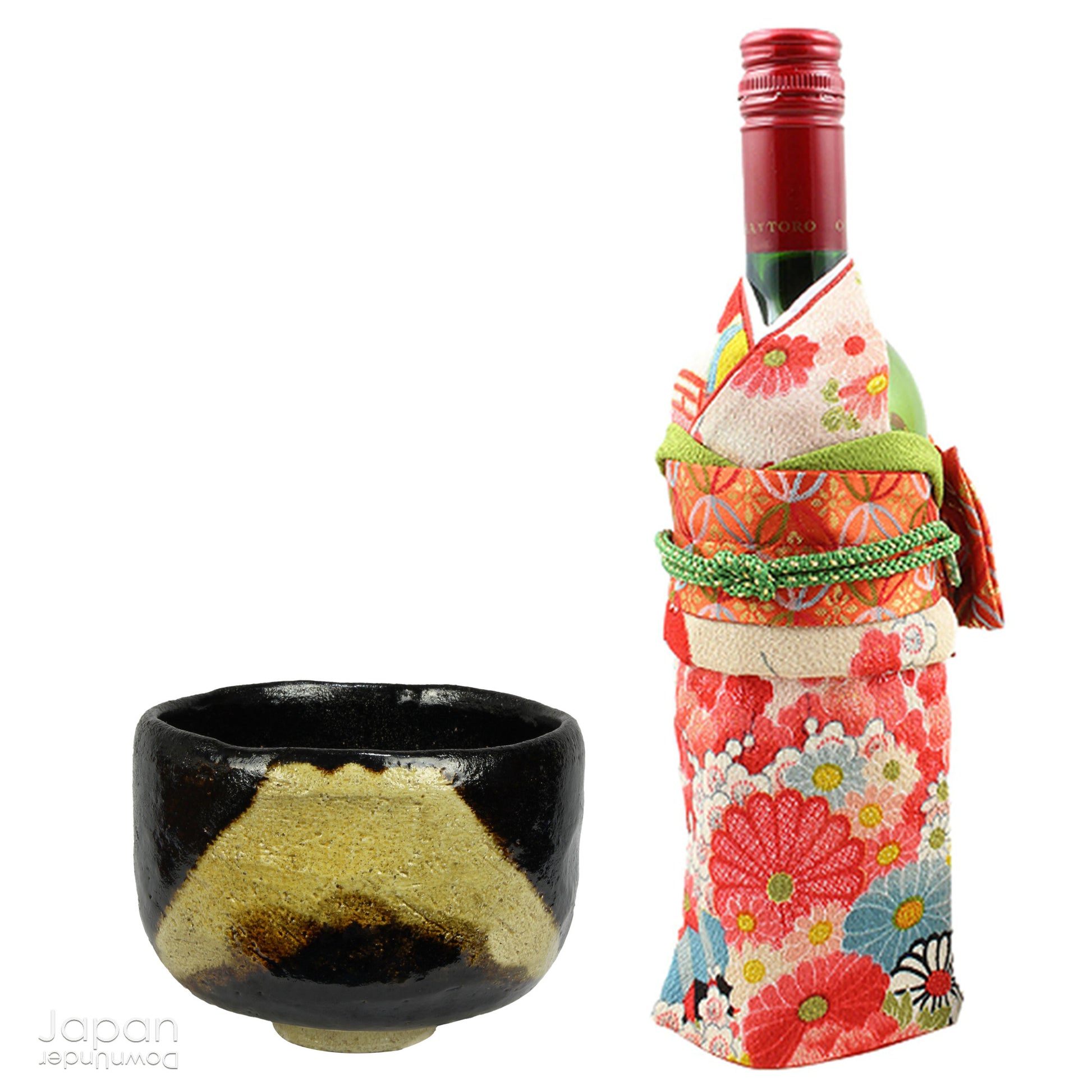 Transform your tea ritual into a refined experience with this stunning vintage black raku ware matcha tea bowl, elegantly adorned with a timeless image of the revered Mt. Fuji. The vibrant green of matcha tea beautifully contrasts against the glossy black finish of this handcrafted piece, bringing a touch of sophistication to any tea ceremony.

Handcrafted with meticulous care, this chawan is a true work of art. It showcases a serene depiction of Mt. Fuji, rendered in soft beige and brown tones that gracefu