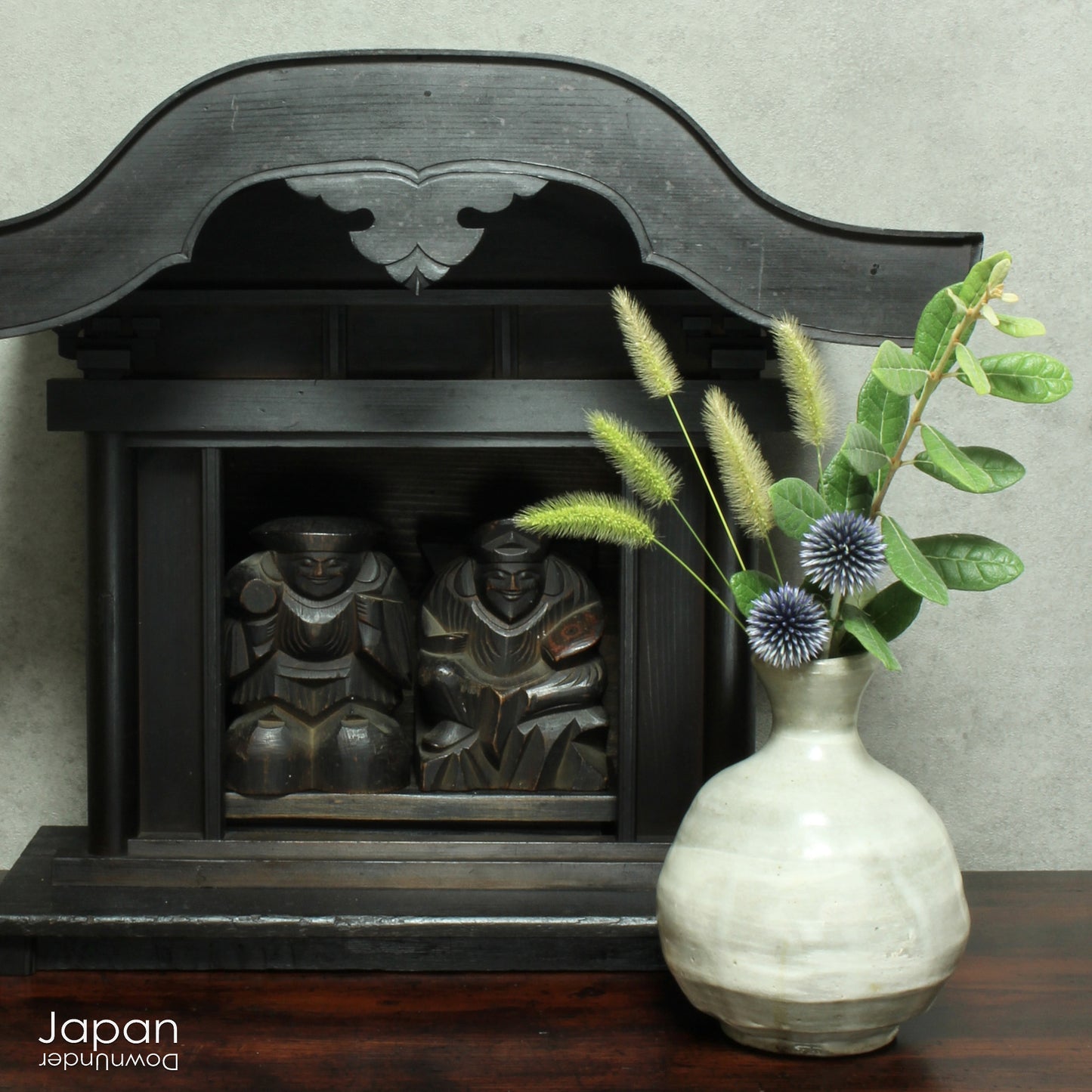 Experience the profound spirituality and artistry of Japan with this authentic Shinto folk faith shrine, dating back to the Meiji era. Perfectly suited for your own kamidana (god shelf) or as a sacred focal point within your home, this antique shrine honors the beloved lucky gods Ebisu and Daikoku - symbols of prosperity, good fortune, and well-being.
