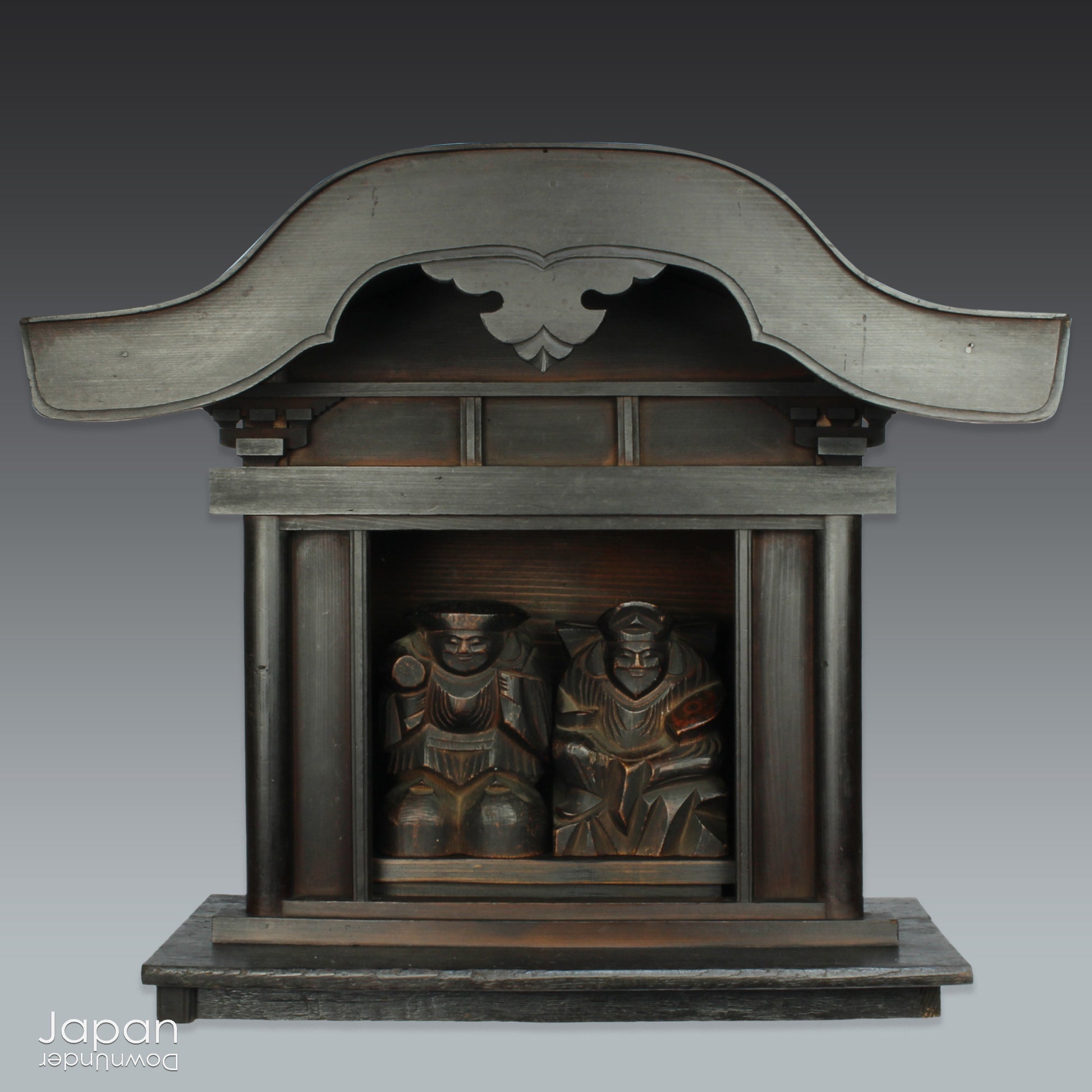 Experience the profound spirituality and artistry of Japan with this authentic Shinto folk faith shrine, dating back to the Meiji era. Perfectly suited for your own kamidana (god shelf) or as a sacred focal point within your home, this antique shrine honors the beloved lucky gods Ebisu and Daikoku - symbols of prosperity, good fortune, and well-being.