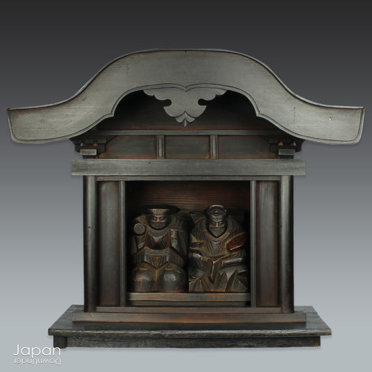 Experience the profound spirituality and artistry of Japan with this authentic Shinto folk faith shrine, dating back to the Meiji era. Perfectly suited for your own kamidana (god shelf) or as a sacred focal point within your home, this antique shrine honors the beloved lucky gods Ebisu and Daikoku - symbols of prosperity, good fortune, and well-being.