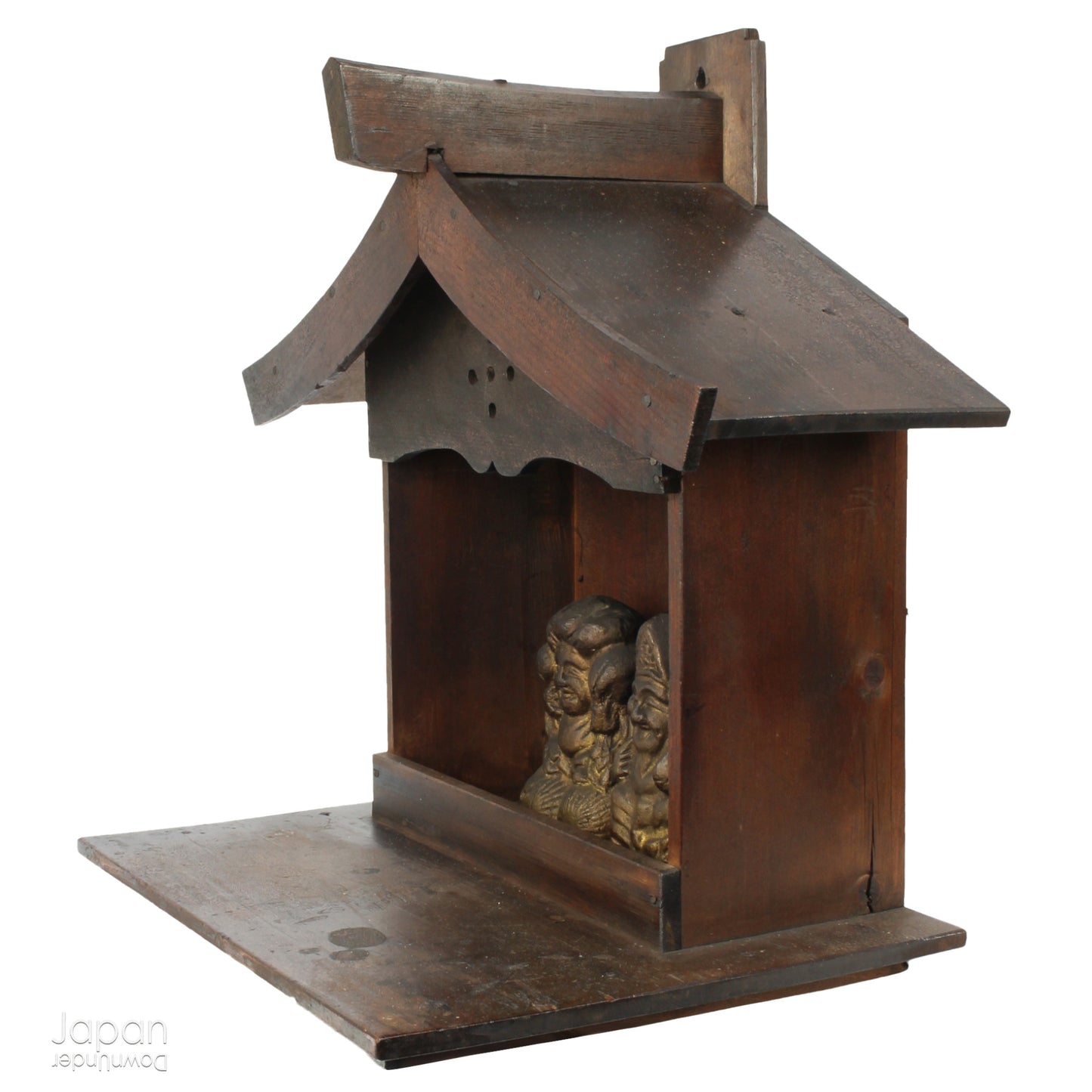 A perfect addition to your spiritual space, this quaint rustic antique Shinto shrine, made to be placed on the kamidana (god shelf), houses the lucky god Ebisu and Daikoku. The charming hand crafted god house embodies the essence of Shinto folk faith.