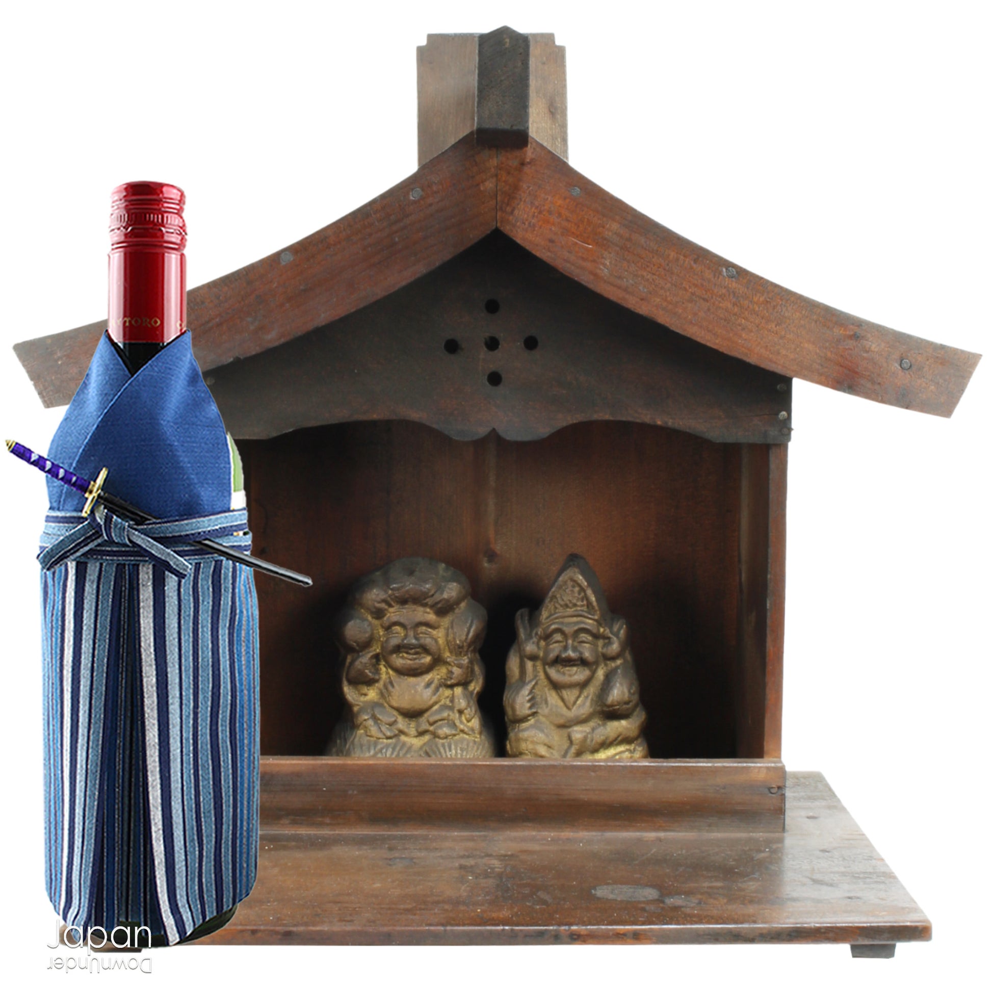 A perfect addition to your spiritual space, this quaint rustic antique Shinto shrine, made to be placed on the kamidana (god shelf), houses the lucky god Ebisu and Daikoku. The charming hand crafted god house embodies the essence of Shinto folk faith