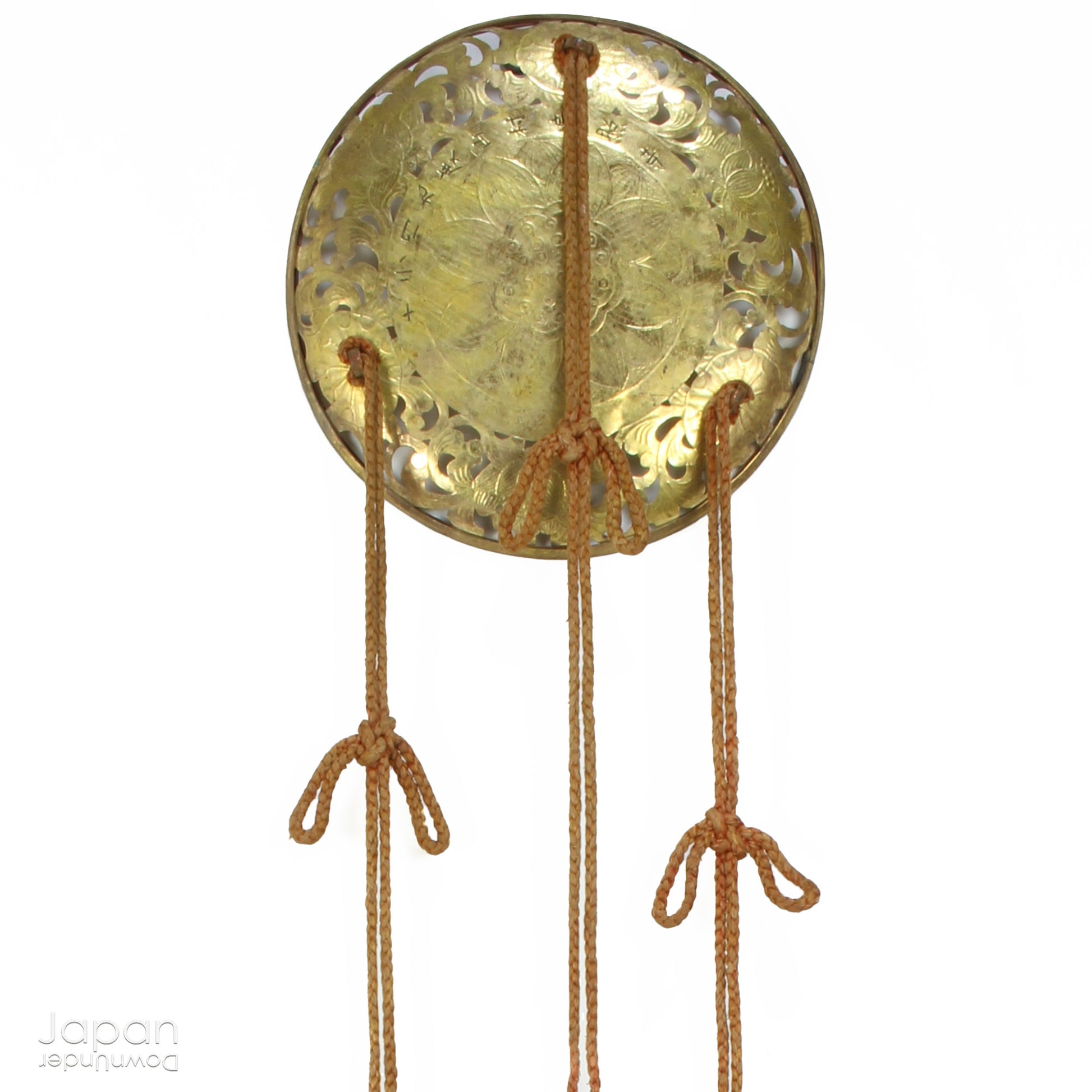 Infuse your home with beauty, spirituality, and history with this Japanese antique Buddhist brass flower plate. Traditionally used in Buddhist ceremonies, this stunning piece represents purification and protection. Whether displayed in your home or meditation space, this unique and meaningful item adds a touch of sacred elegance to any setting.
