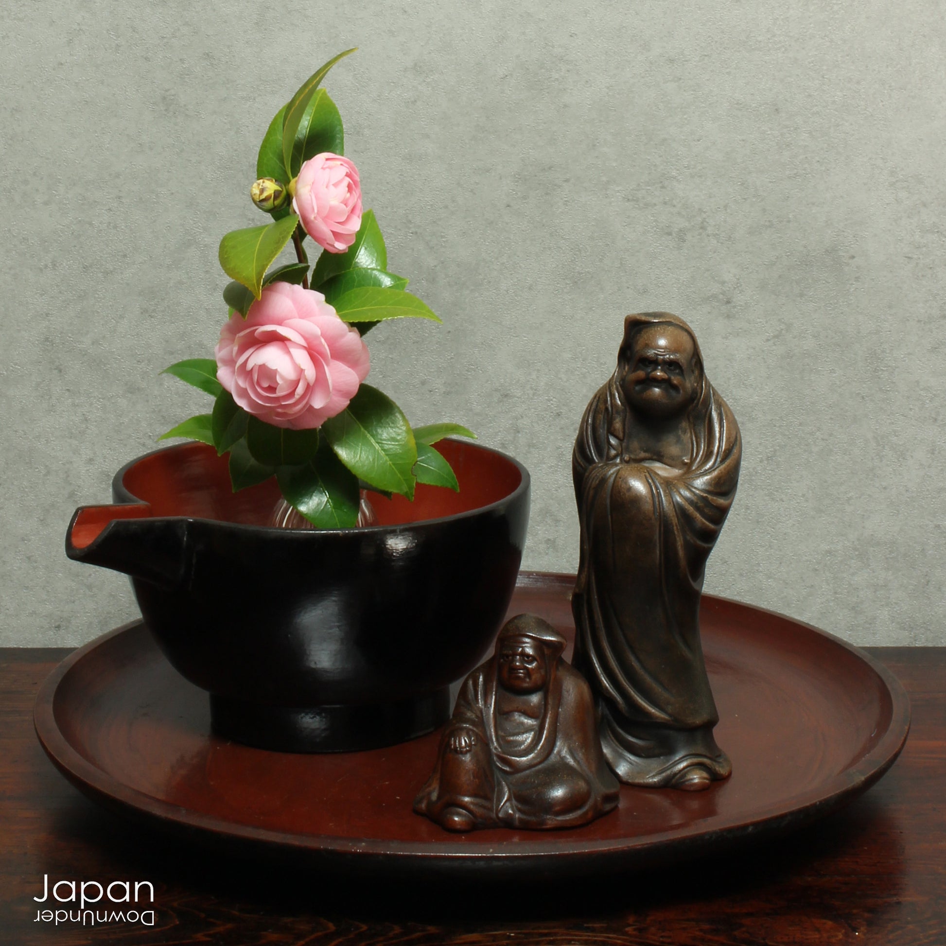 A stunning 1800’s Japanese folk art lacquer sake pourer. This versatile piece doubles as a unique flower vase or beautiful art object, adding a touch of rustic charm to any decor. With the wonderful patina of use, it a truly one-of-a-kind treasure. 
