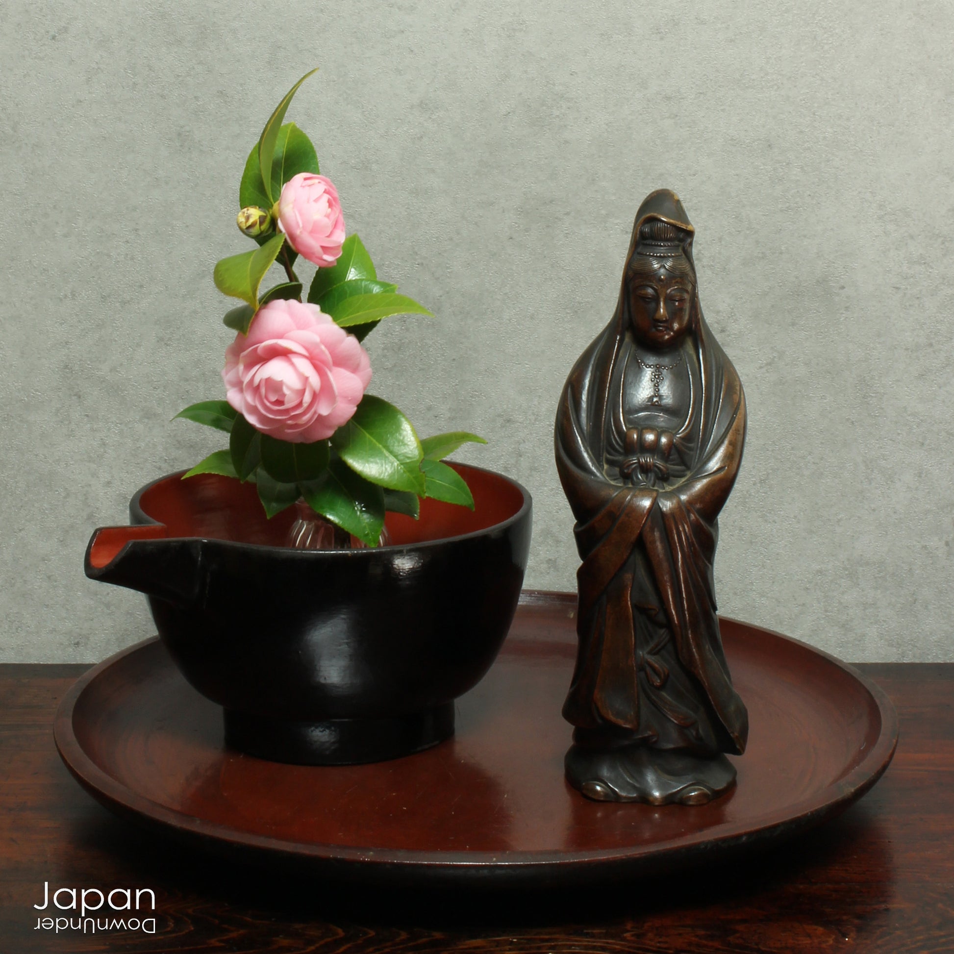 A stunning 1800’s Japanese folk art lacquer sake pourer. This versatile piece doubles as a unique flower vase or beautiful art object, adding a touch of rustic charm to any decor. With the wonderful patina of use, it a truly one-of-a-kind treasure. 
