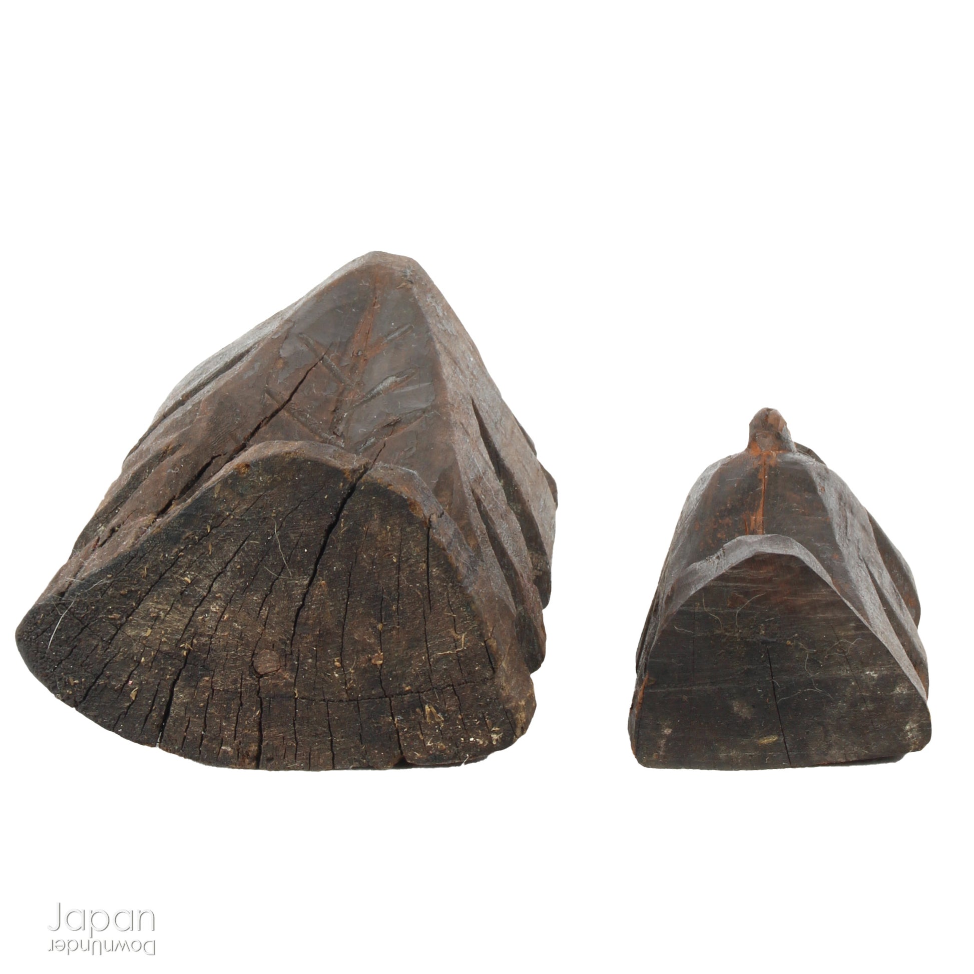 A collection of old hand-carved Enku-style Buddha and Kannon statues.  Enku was a Buddhist monk, much loved for his simple, folk art statues, carved during his many pilgrimages  to the mountains.  These old carvings are made of a light wood.