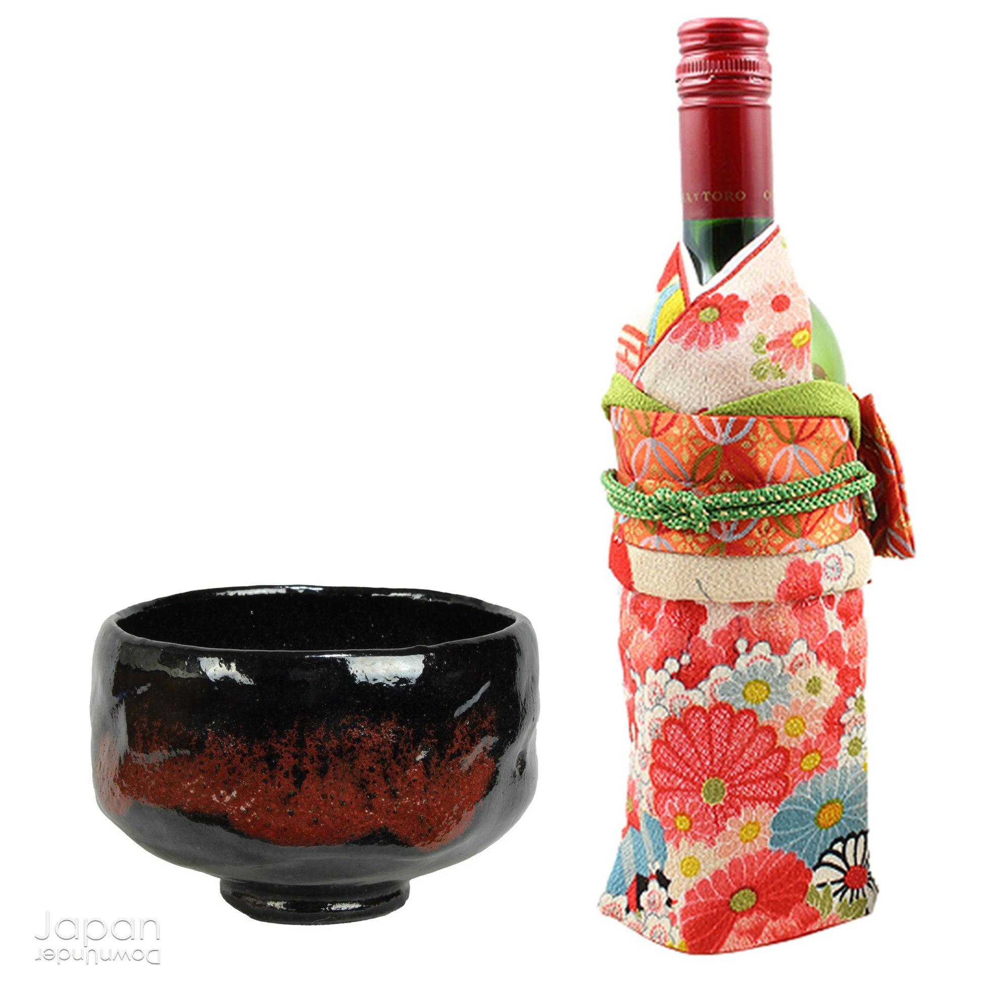 Elevate your tea experience with this stunning vintage black raku ware matcha tea bowl, a timeless work of art that brings both beauty and sophistication to every sip. Handcrafted in Kyoto, Japan, this elegant bowl features a striking contrast between the glossy black glaze and subtle reddish-brown accents that emerge randomly across the surface - each one a testament to the artistry and uniqueness of the raku firing process.