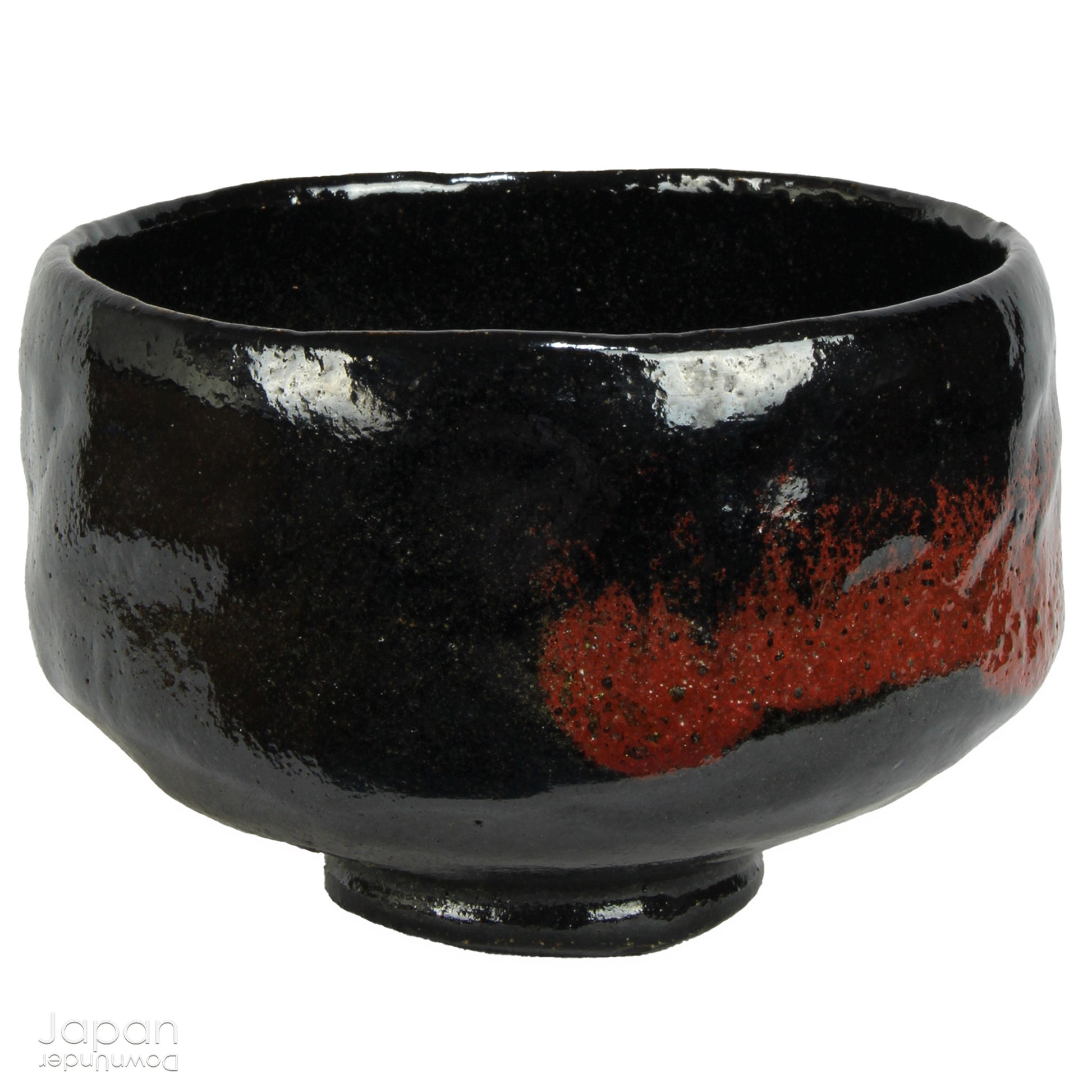 Elevate your tea experience with this stunning vintage black raku ware matcha tea bowl, a timeless work of art that brings both beauty and sophistication to every sip. Handcrafted in Kyoto, Japan, this elegant bowl features a striking contrast between the glossy black glaze and subtle reddish-brown accents that emerge randomly across the surface - each one a testament to the artistry and uniqueness of the raku firing process.