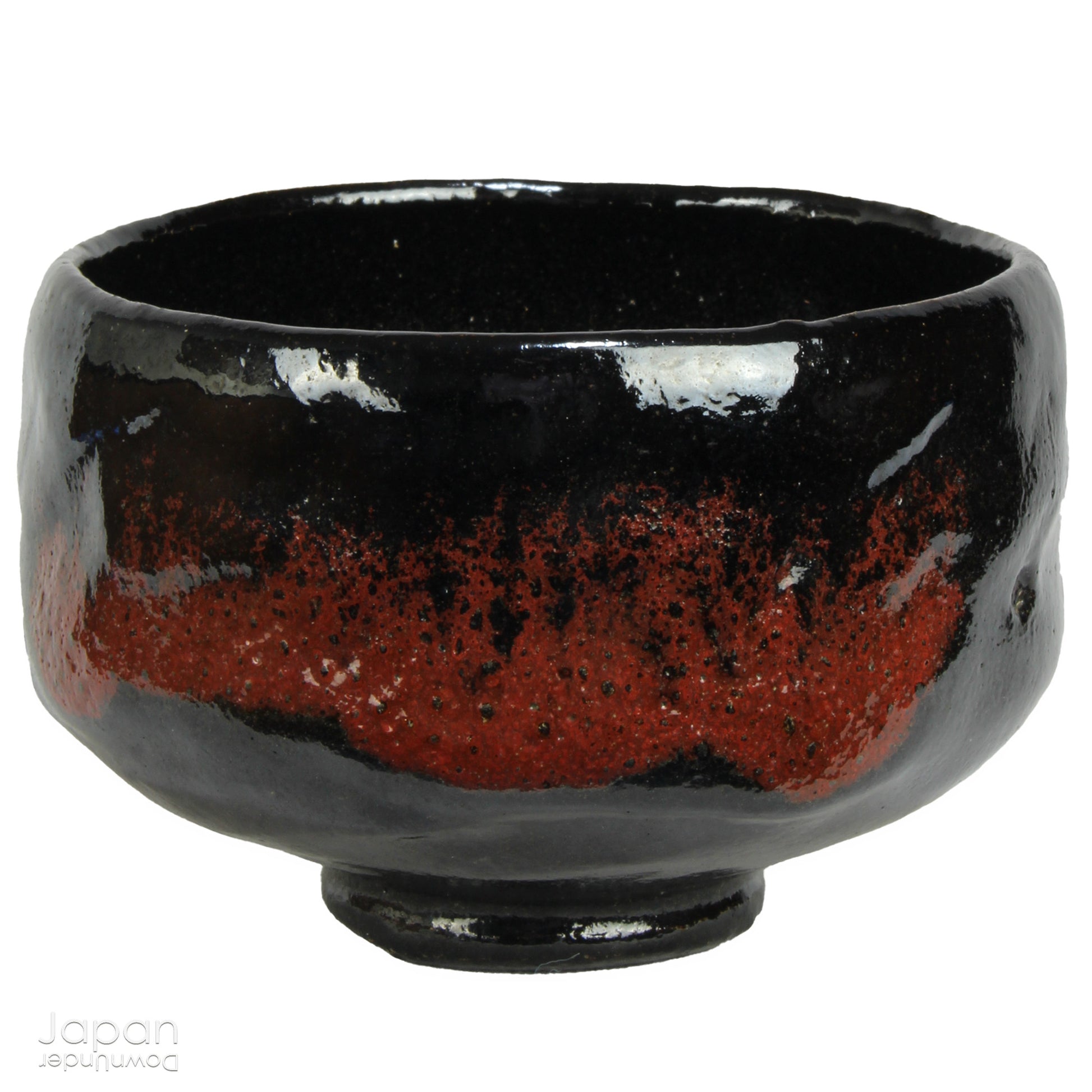 Elevate your tea experience with this stunning vintage black raku ware matcha tea bowl, a timeless work of art that brings both beauty and sophistication to every sip. Handcrafted in Kyoto, Japan, this elegant bowl features a striking contrast between the glossy black glaze and subtle reddish-brown accents that emerge randomly across the surface - each one a testament to the artistry and uniqueness of the raku firing process.