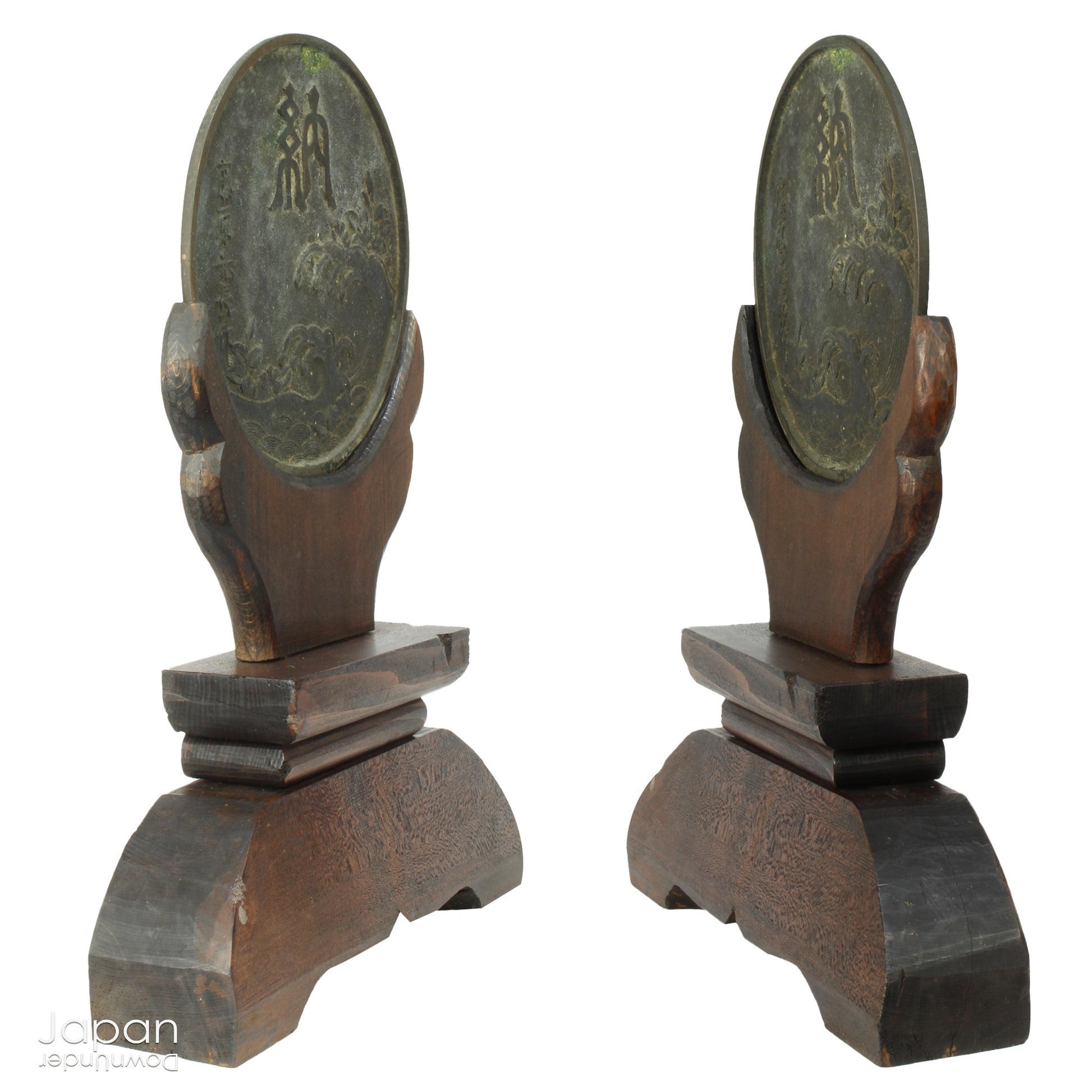 Infuse your spiritual setting with history and reverence through this traditional Japanese Shinto home altar mirror, or shinkyo, set within a hand-carved wooden stand. Once placed on the kamidana - the household altar of a historic Japanese home - this piece carries a deep sense of presence and cultural heritage.