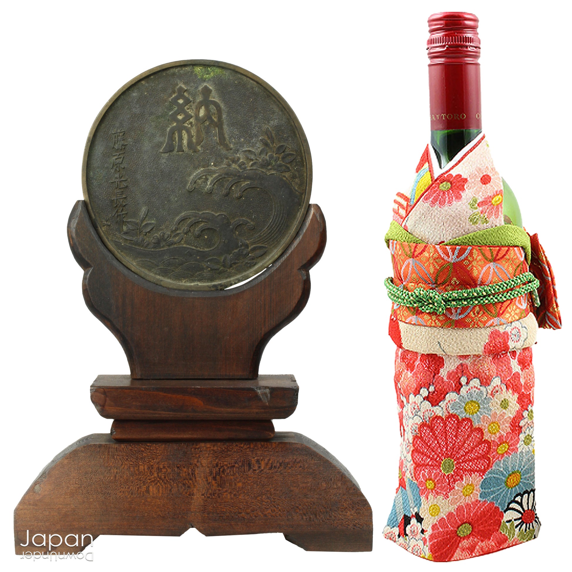 Infuse your spiritual setting with history and reverence through this traditional Japanese Shinto home altar mirror, or shinkyo, set within a hand-carved wooden stand. Once placed on the kamidana - the household altar of a historic Japanese home - this piece carries a deep sense of presence and cultural heritage.