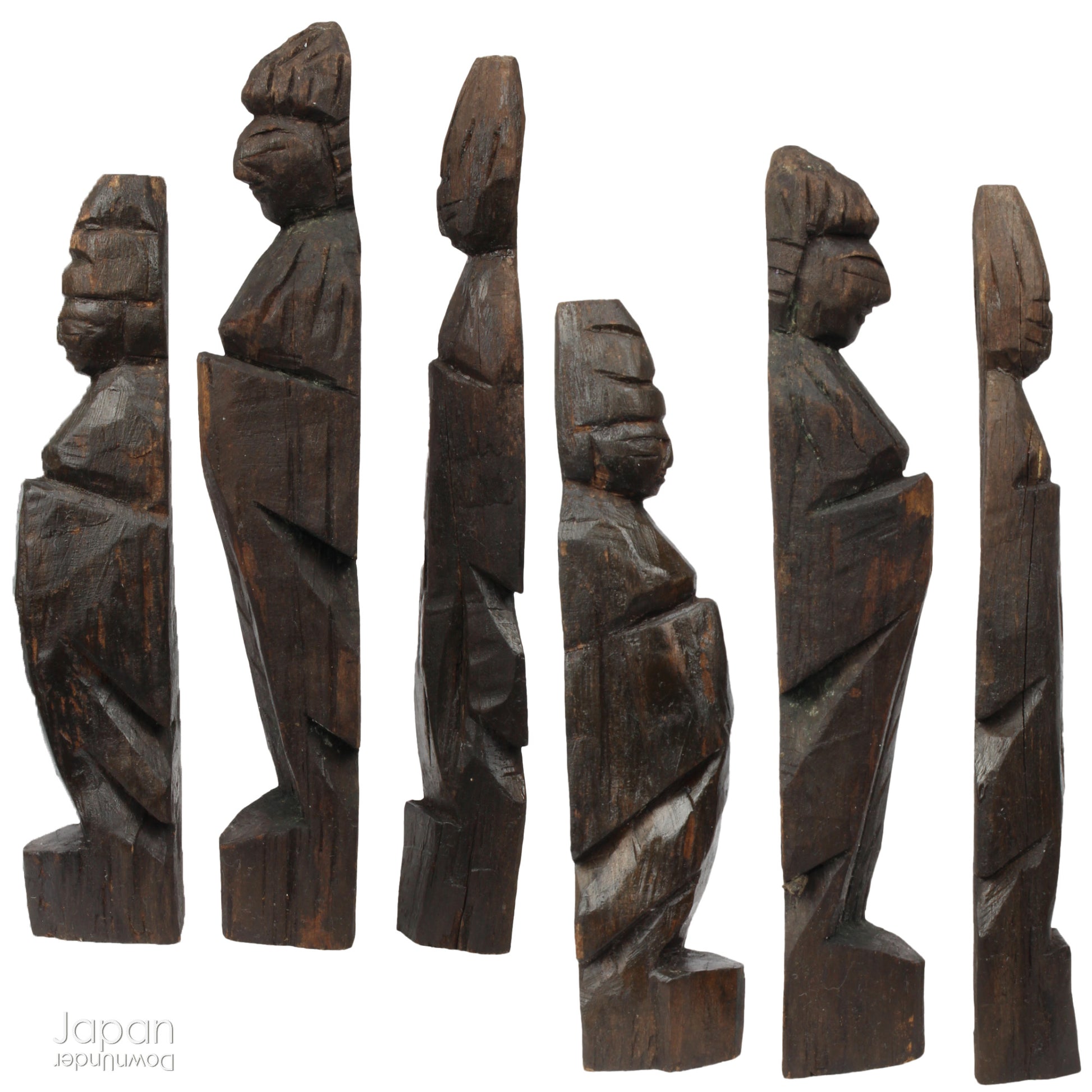 A collection of old hand-carved Enku-style Buddha and Kannon statues.  Enku was a Buddhist monk, much loved for his simple, folk art statues, carved during his many pilgrimages  to the mountains.  These old carvings are made of a light wood.