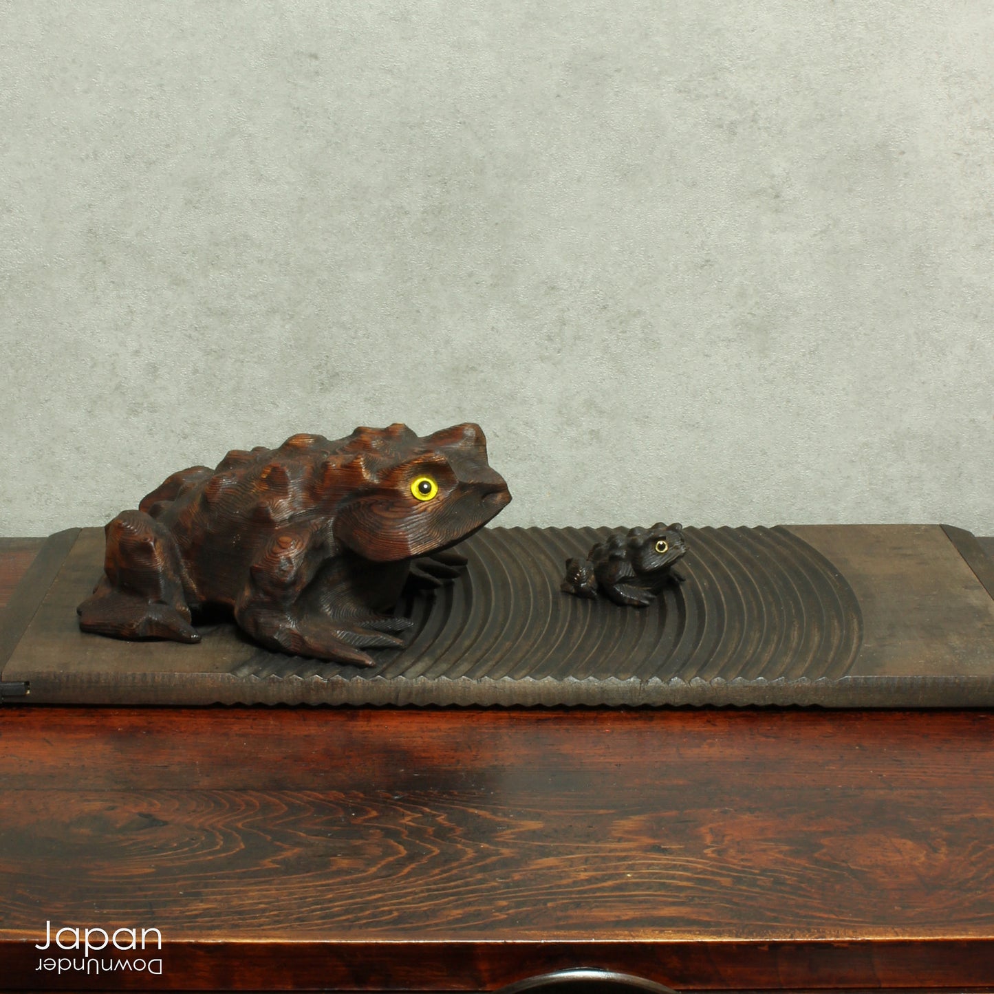 Bring a sense of joy, prosperity, and playful charm to your space with this delightful pair of vintage, handcrafted cypress wood frogs. These enchanting figures, lovingly created to symbolize good fortune, are more than just decor - they're a charming, lucky addition to any home. Perfect for collectors, nature lovers, or anyone who appreciates unique, meaningful treasures!