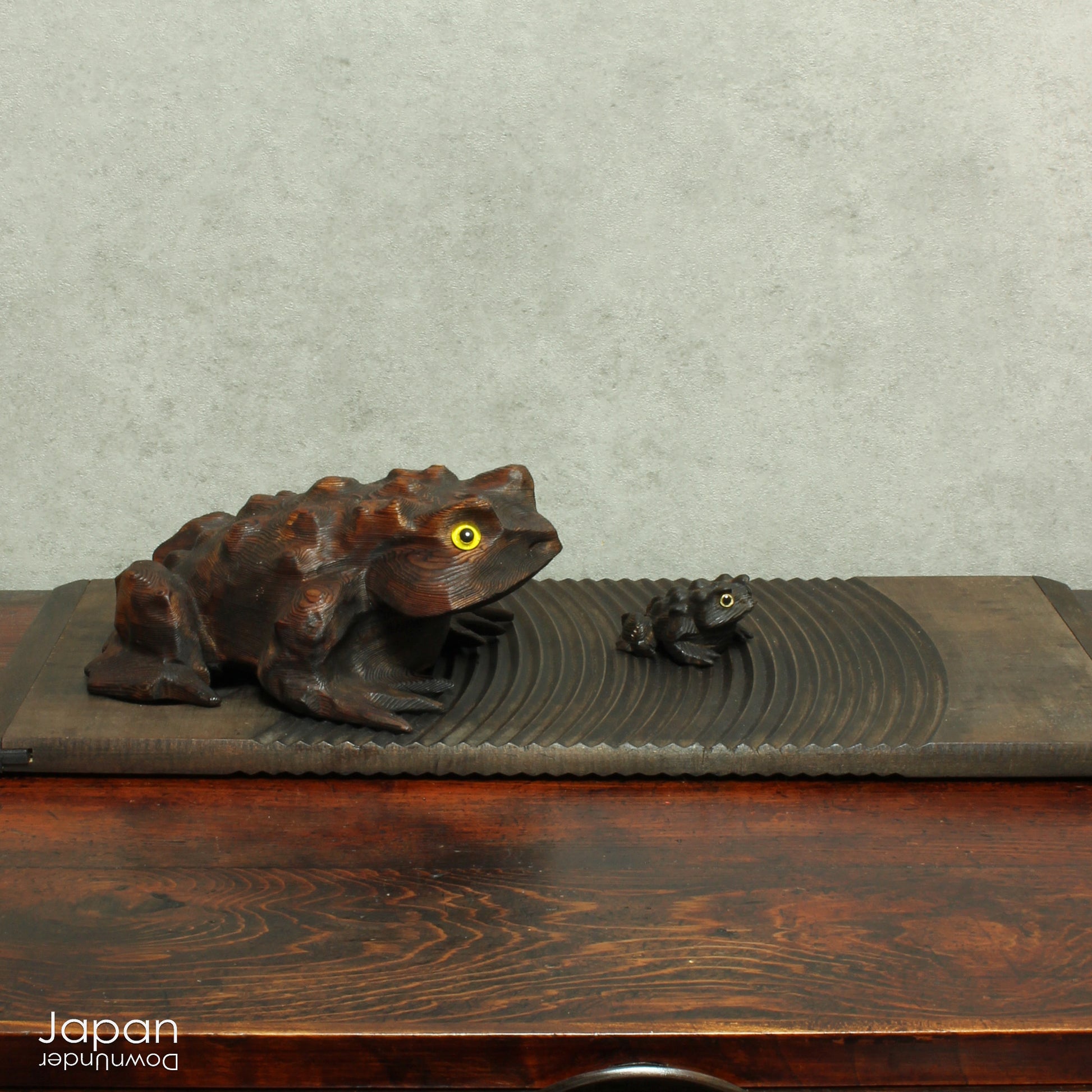 Bring a sense of joy, prosperity, and playful charm to your space with this delightful pair of vintage, handcrafted cypress wood frogs. These enchanting figures, lovingly created to symbolize good fortune, are more than just decor - they're a charming, lucky addition to any home. Perfect for collectors, nature lovers, or anyone who appreciates unique, meaningful treasures!