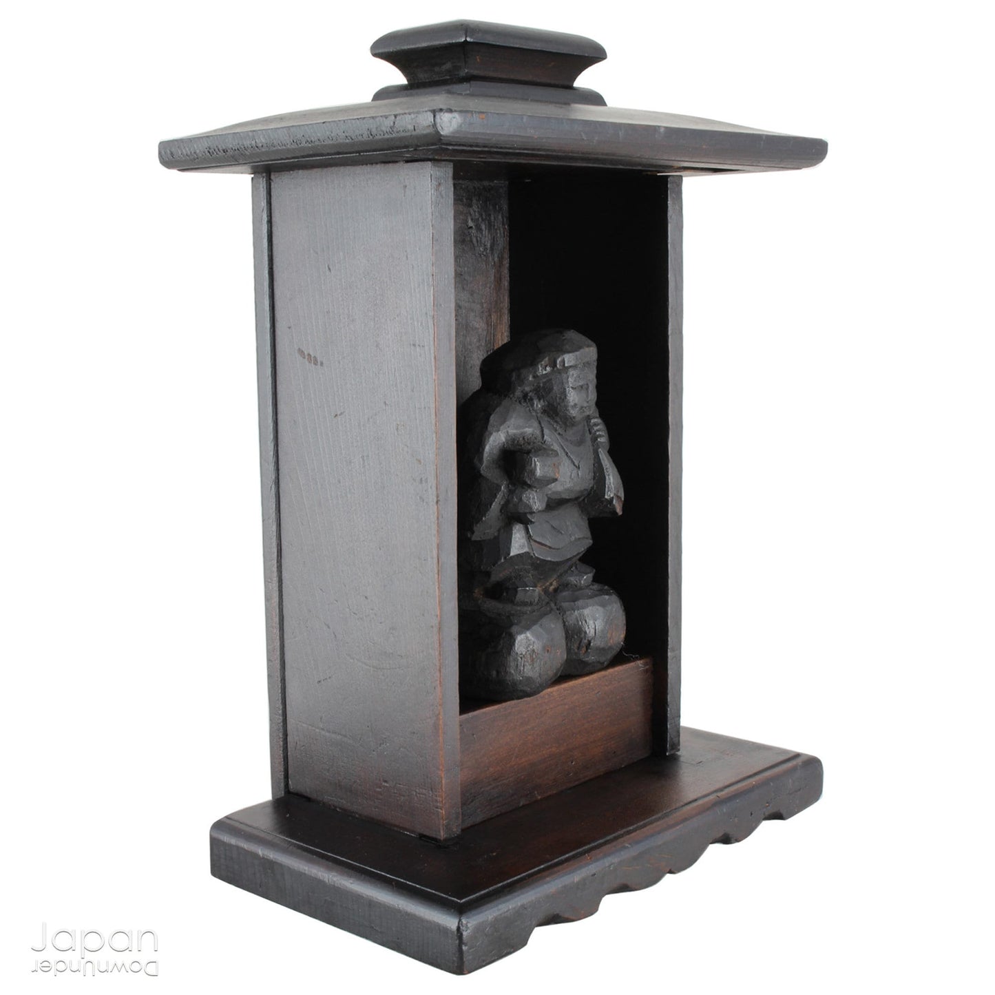 A perfect addition to your spiritual space, this quaint rustic antique Shinto shrine, made to be placed on the kamidana (god shelf), houses the lucky god Daikoku. The charming hand crafted god house embodies the essence of Shinto folk faith, creating an atmosphere of serenity in your home. A meaningful decor piece, that not only celebrates traditional Japanese beliefs but also invites blessings into your home.
