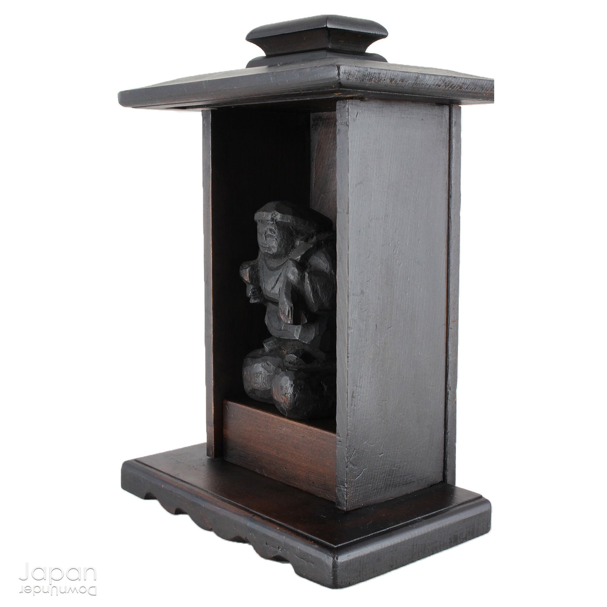 A perfect addition to your spiritual space, this quaint rustic antique Shinto shrine, made to be placed on the kamidana (god shelf), houses the lucky god Daikoku. The charming hand crafted god house embodies the essence of Shinto folk faith, creating an atmosphere of serenity in your home. A meaningful decor piece, that not only celebrates traditional Japanese beliefs but also invites blessings into your home.
